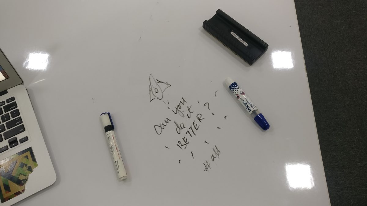 Image with "can you do it better?" written on a white board at rtCamp's office